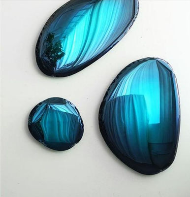Spiegelstaal blauw-groen wanddecoratie
