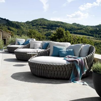 Luxe hotel buitenshuis rattan rond bed Alfresco ligstoel sofa